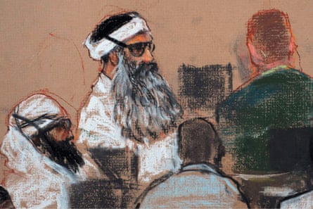 Khalid Sheikh Mohammed, center, and co-defendant Walid Bin Attash, left, attending a pre-trial session at Guantánamo Bay.