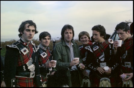 Paul with members of the Campbeltown Pipe Band who played on Wings’ 1977 single Mull of Kintyre.