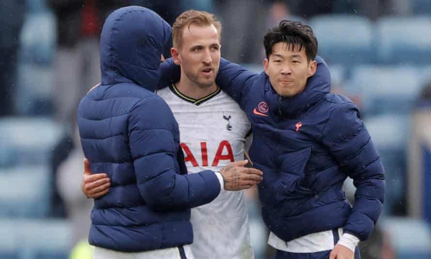 Harry Kane is embraced by Tottenham teammates at the end of what he hopes was his final appearance for the club.