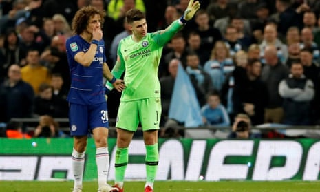 Chelsea’s Kepa Arrizabalaga gestures to his manager that he is not going to come off during the League Cup final against Manchester City on Sunday.