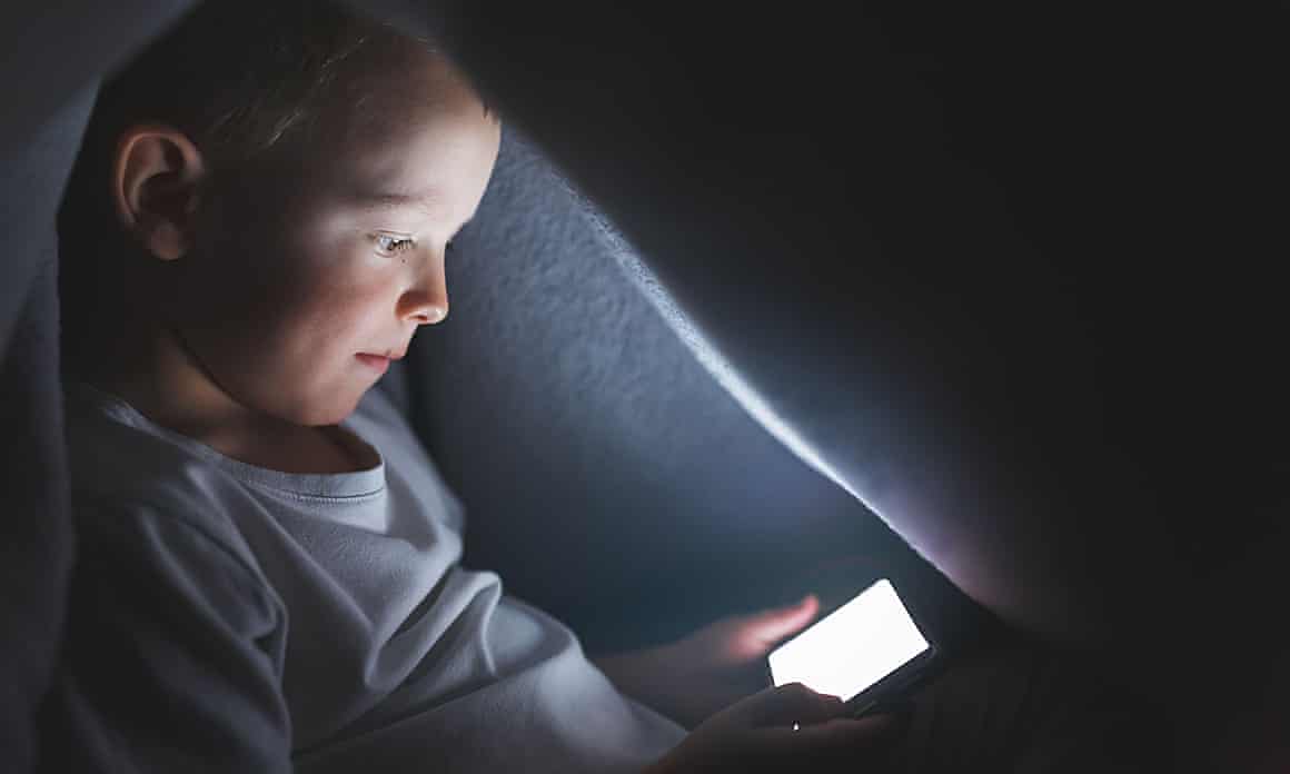 Child playing with smartphone