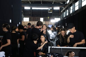 Models and staff - all in black t-shirts