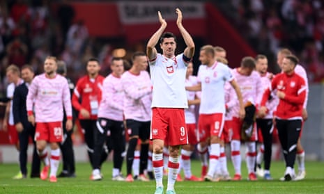 Robert Lewandowski applauds the fans after Poland's draw with England