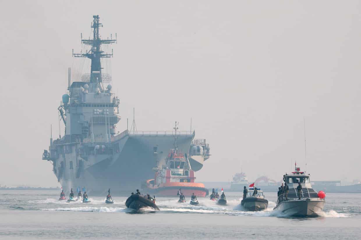 Aircraft carrier escorted by Indonesia’s navy