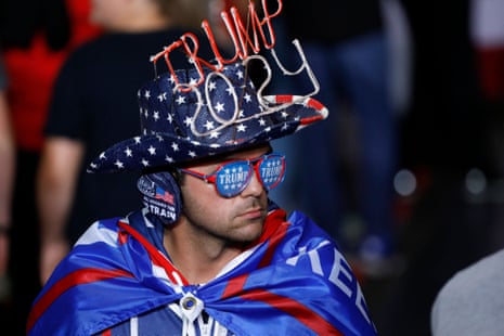 A man in Trump gear attends Donald Trump's Save America rally on 1 October 2022 in Warren, Michigan.