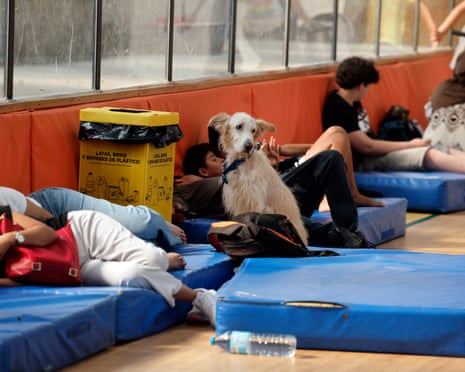 Inhabitants of the La Vall d'Uixo's region who have been forced to evacuate their homes rest at the pavilion of Nules, Castellón, Spain.