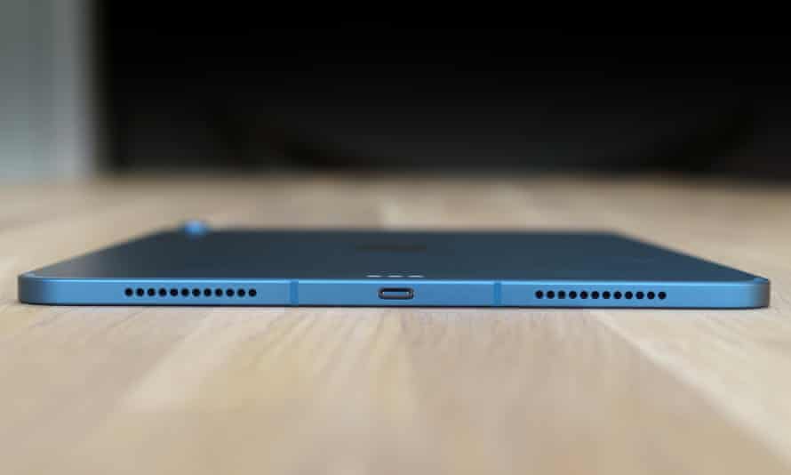 the iPad Air laying flat on a table showing its USB-C port