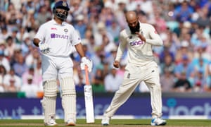 England’s Moeen Ali celebrates taking the wicket of India’s Virat Kohli.