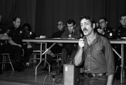 a man speaks into a microphone