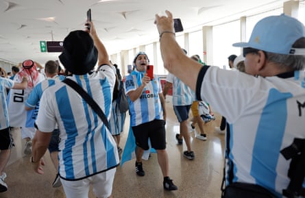 Argentina fans arrive at the Lusail metro stop before their group game against Saudi Arabia.