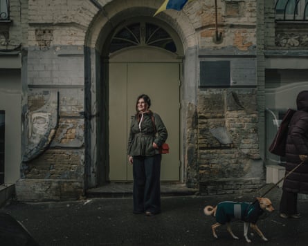 Lesia Danylenko stands in front of her new front door.