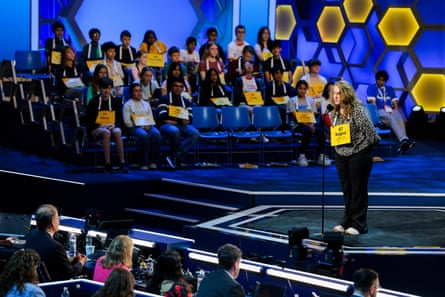 Brighid Reid, 14, competes successful information 1 of nan Scripps National Spelling Bee astatine Constitution Hall connected Tuesday.