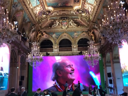 John Vidal projected large on screen at an event during the Paris COP21 in 2015.