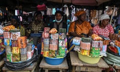 Street vendors sell medicine at a market in Abobo, a suburb of Abidjan, Ivory Coast.
