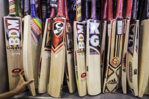A batsman chooses his weapon of choice.