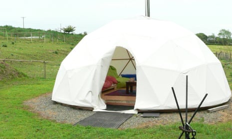 canvas geodesic dome in a plot of grassy land