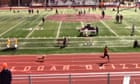 Dog breaks loose to win relay race in US high school track event - video
