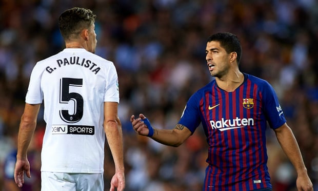 Gabriel Paulista argues with Luis Suárez during a La Liga game. ‘Suárez talks to you all the time because he wants to put you off. But at the end, he’ll give you a hug’