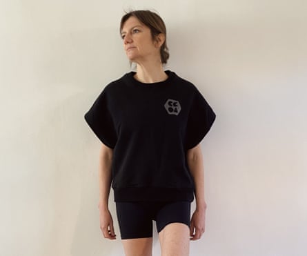Ana Santi wearing black top and shorts.