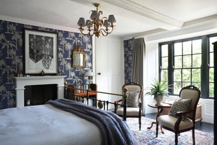 Tour de force: the wallpaper in the bedroom has a palm motif, to reflect past tastes.
