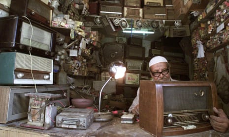 An Iraqi man repairs radios in Baghdad. Photograph: Reuters