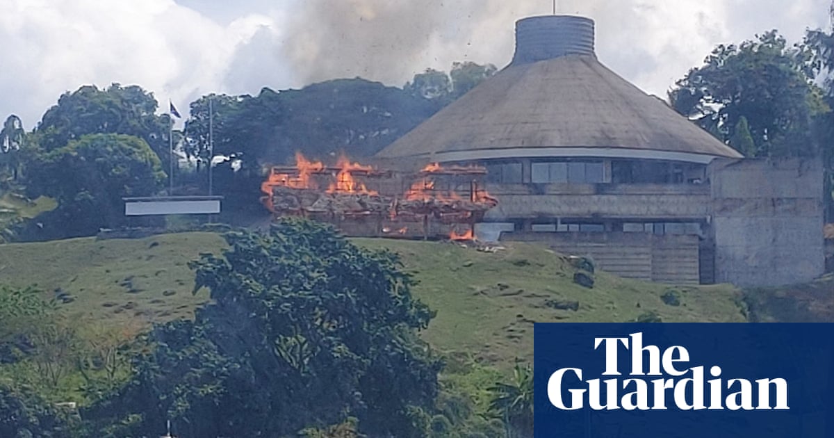 Parliament building and police station burned down during protests in Solomon Islands