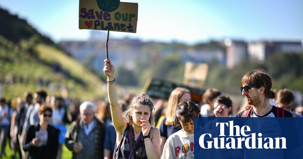 'Enough is enough’: biggest-ever climate protest sweeps UK