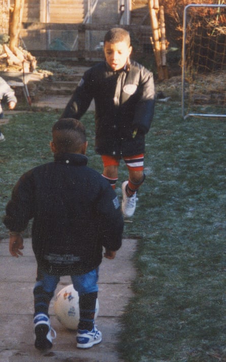 Troy Deeney playing garden football growing up in Birmingham.