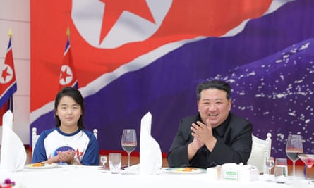 The Kim family enjoy a banquet to celebrate the launch of a reconnaissance satellite in Pyongyang in November 2023.