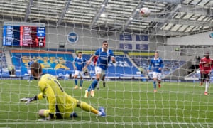 Neal Maupay of Brighton and Hove Albion scores their first goal