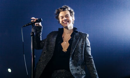 Harry Styles showing off his male cleavage.