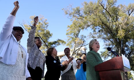 Mothers of the Movement members Gwen Carr, Sybrina Fulton, Lucia McBath, Maria Hamilton and Geneva Reed-Veal cheer as Hillary Clinton speaks during a campaign rally at Saint Augustine’s University on Sunday in Raleigh, North Carolina.