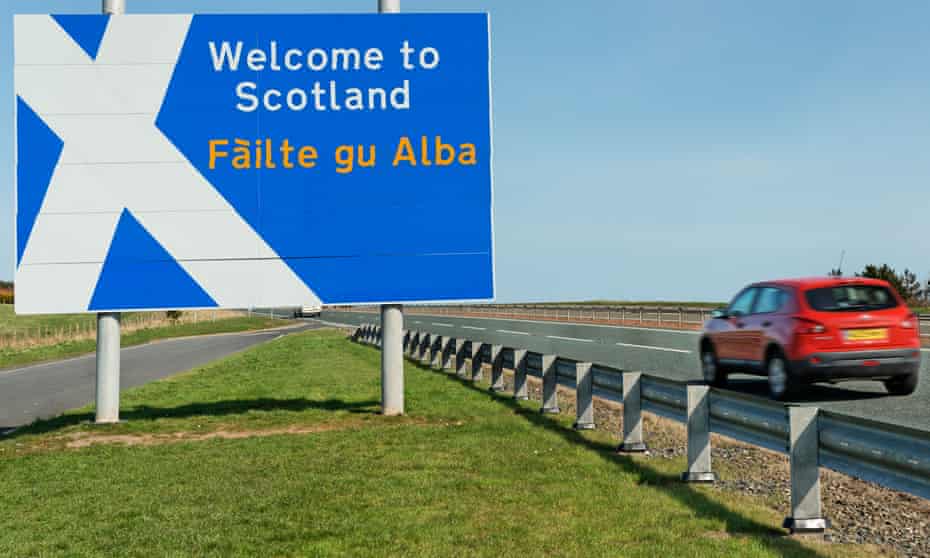 A border sign, including Gaelic, on the A1 north of Berwick on Tweed.