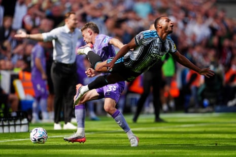 Adrien Truffert fouls Jacob Murphy.