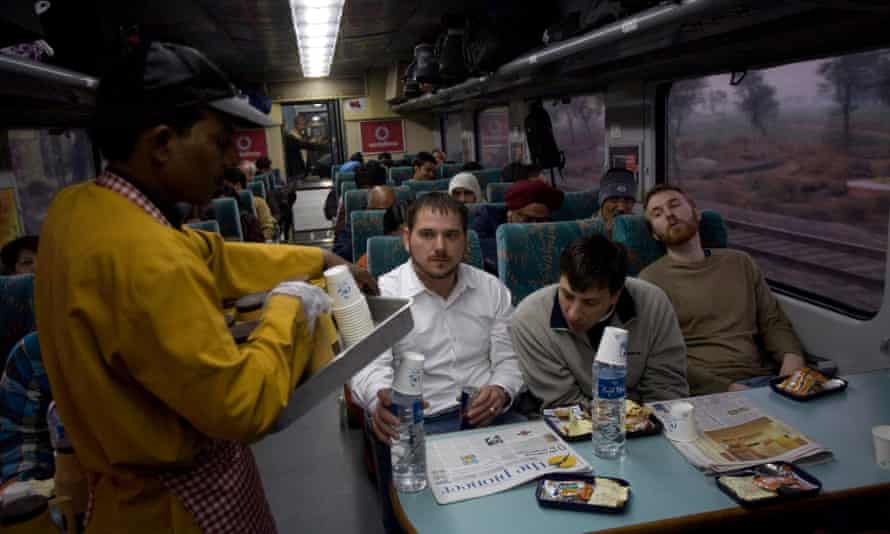 Passengers being served breakfast on the Delhi-Agra Shatabdi Express.