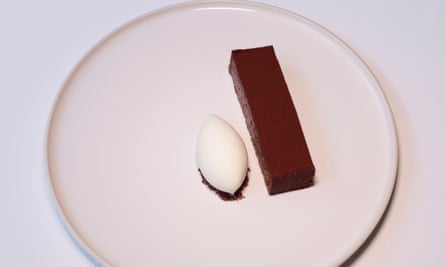 ‘Pitch perfect and cloud like’: chocolate tart with coconut ice-cream.