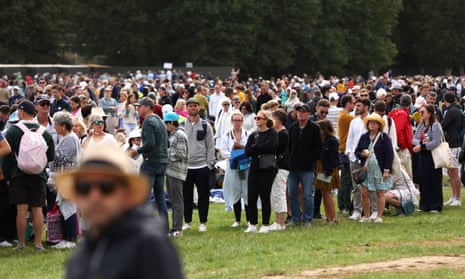 Fans queue in Wimbledon Park.