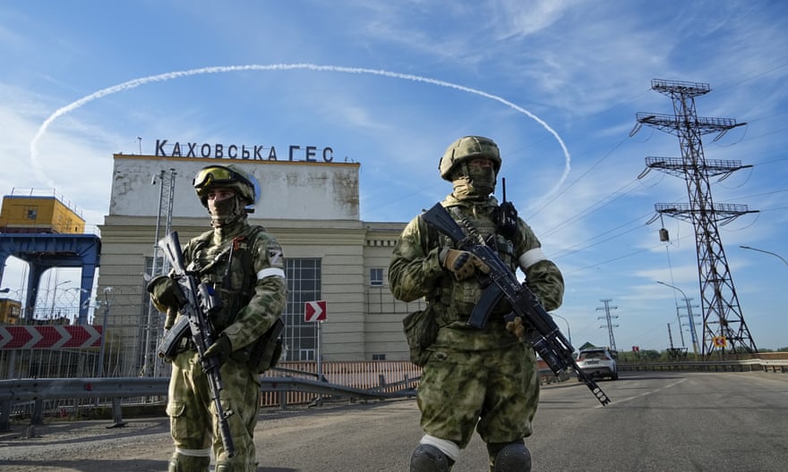 Russian troops guard the Kakhovka hydroelectric plant in southern Ukraine’s Kherson region
