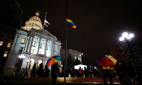 People gather at the Colorado state capitol for a candlelight vigil on Wednesday.