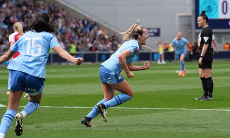 Manchester City's Lauren Hemp celebrates after scoring the opening goal of the game.