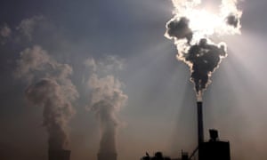 A coal power plant in China spews out smoke and dust