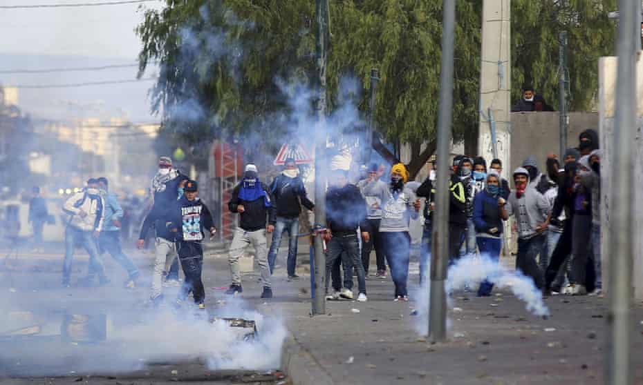 Protesters throw rocks at police as teargas is fired in Kasserine