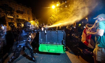 Riot police use pepper spray on protesters in Georgia