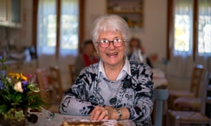 Nonna Maria sitting at a table