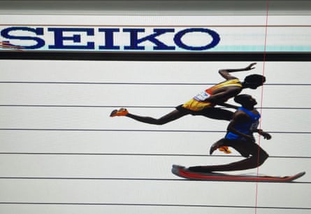 A photo-finish image showing Alphonce Simbu winning the marathon