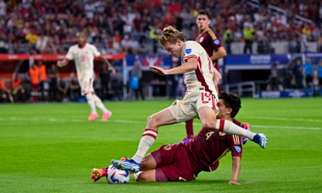 Jacob Shaffelburg fights through the Venezuela defense.