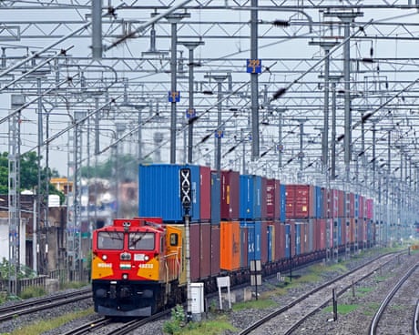 An Indian train carrying shipping containers