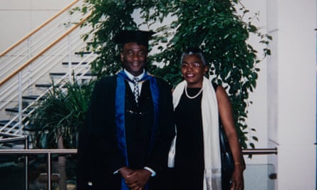 Olufemi with Tinu after receiving a master’s from Coventry University in 2005.