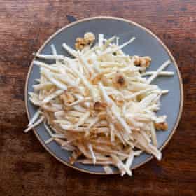 Bourdain beats walnut oil into his dressing. And who would argue?