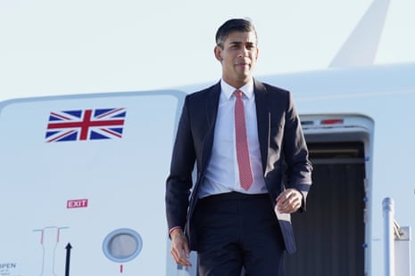 British Prime Minister Rishi Sunak disembarks his plane as he arrives in San Diego on Sunday